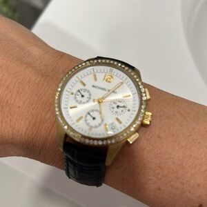 Michael Kors black crocodile crystal watch
Michael Kors